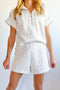white-leopard-jacquard-quarter-zip-tee-and-shorts-set