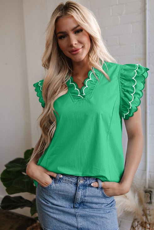 green v neck blouse