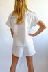 white-leopard-jacquard-quarter-zip-tee-and-shorts-set