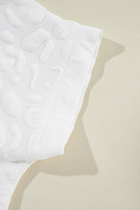 white-leopard-jacquard-quarter-zip-tee-and-shorts-set