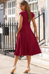 Red Dahlia Solid Color V Neck Pleated Flared Midi Dress