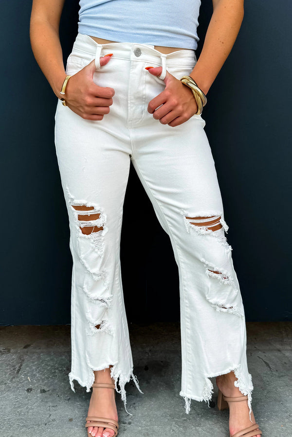 White Asymmetric Distressed Raw Hem Cowgirl Jeans