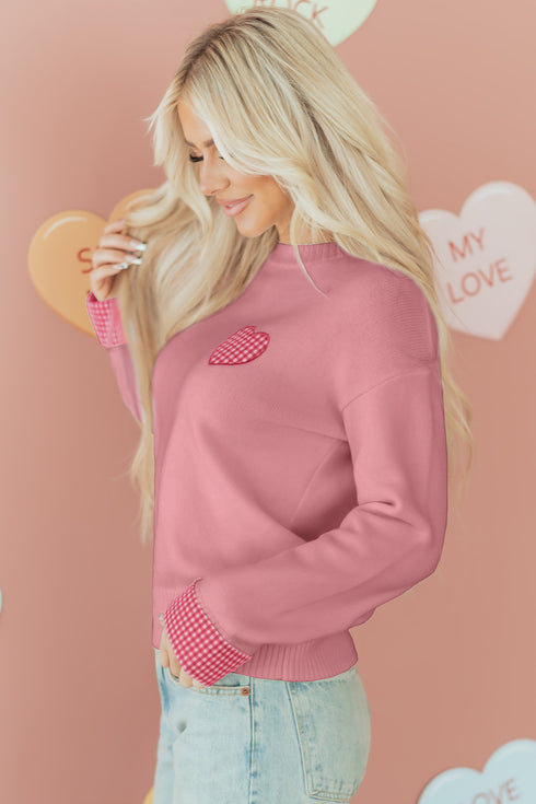 light pink sweater
