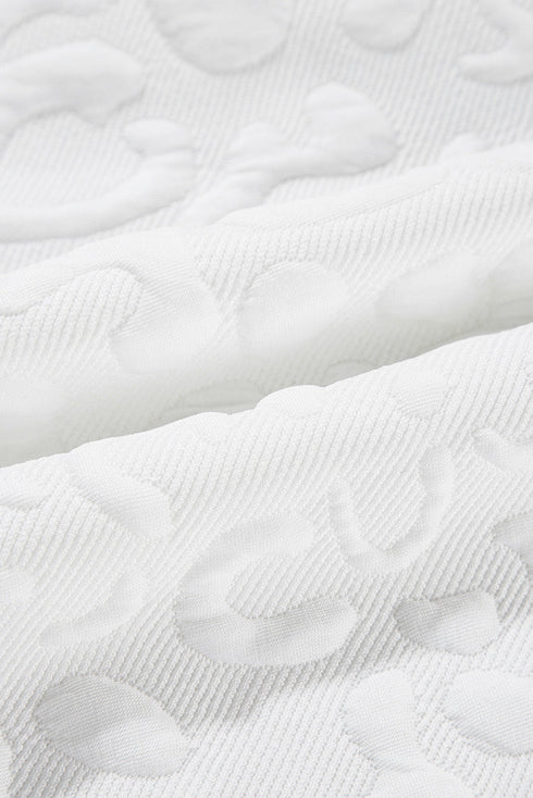 white-leopard-jacquard-quarter-zip-tee-and-shorts-set