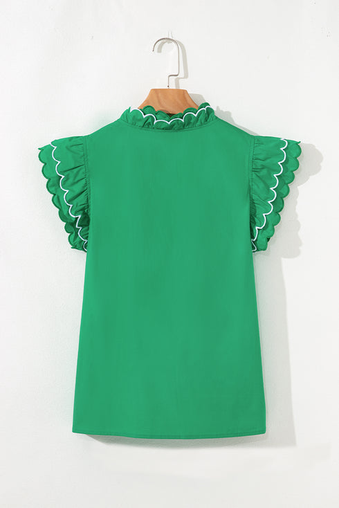 green v neck blouse