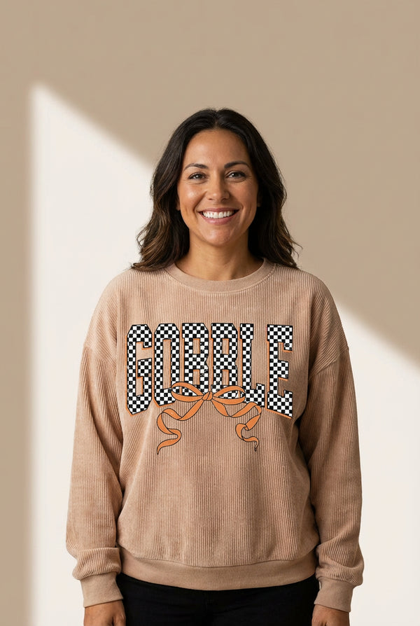 Gobble Checkered Graphic Ribbed Sweatshirt in Apricot with practical styling and dependable silhouette control.