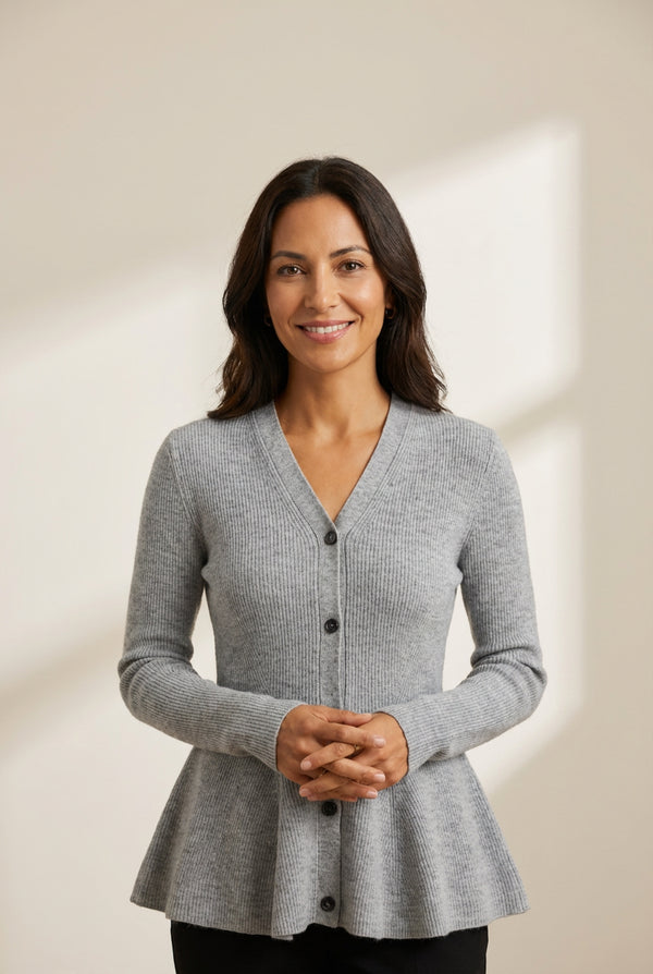 Women's V-Neck Ribbed Peplum Button-Down Cardigan Sweater made for easy styling and wardrobe coordination, with premium-like structure and finish.