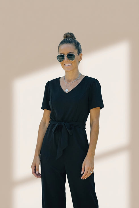 Women's Twisted Silk V-Neck Jumpsuit with Flared Waist Trousers and Pockets