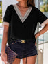 Delicate Black Lace-Trimmed V-Neck Blouse with Short Sleeves