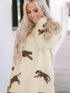 parchment-lively-cheetah-print-high-neck-split-hem-sweater