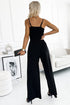 Elegant Black Jumpsuit with Slit Leg and Pocket Detail