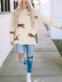 parchment-lively-cheetah-print-high-neck-split-hem-sweater