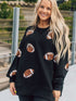 Shimmering Black Sequin Rugby Graphic Sweater