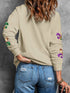 Shimmering Khaki Mardi Gras Sequin Graphic Crewneck Sweater