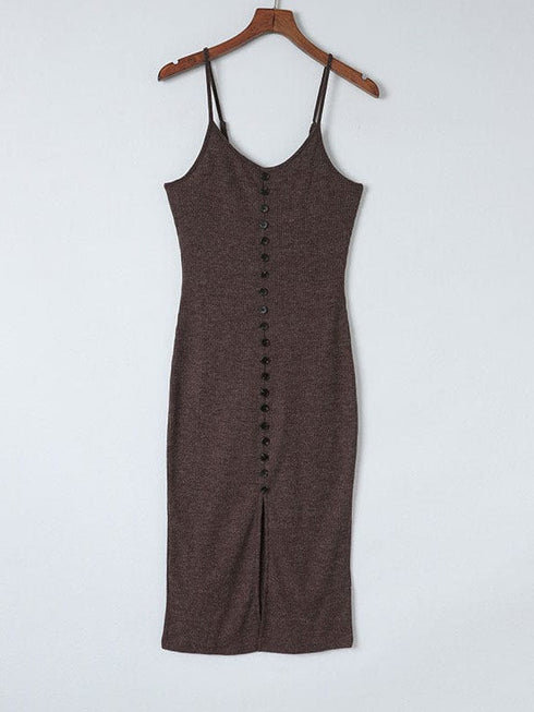 Sleek sexy hip-hugging dress in a solid color with tight knitted skirt featuring a slit-mid design