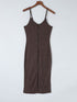 Sleek sexy hip-hugging dress in a solid color with tight knitted skirt featuring a slit-mid design