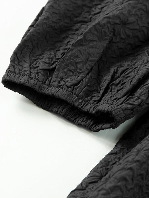 Stylish Black Square Neck Peplum Top with Textured Puff Sleeves