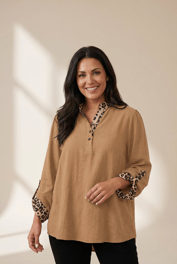 Women's Camel Leopard Patchwork Blouse with Polo Neck and Roll-Tab Sleeves with practical styling and dependable silhouette control.