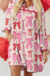 Women's Pink Bow Print Mini Dress with Contrast Trim, V-Neck, Long Sleeve, Casual Shift Style for Effortless Chic