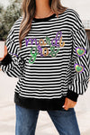 Women's Black Stripe Long Sleeve Graphic Top with Sequin Heart Patch and Raw Seam Detail for Mardi Gras Style
