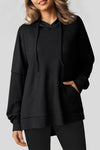 Cozy Women's Black Oversized Fleece-Lined Hoodie with High-Low Hem & Waffle Knit for Ultimate Comfort and Style