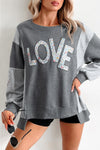Trendy Women's Dark Grey LOVE Graphic Sweatshirt with Exposed Seams & Stylish Asymmetrical Hem for Effortless Chic Look