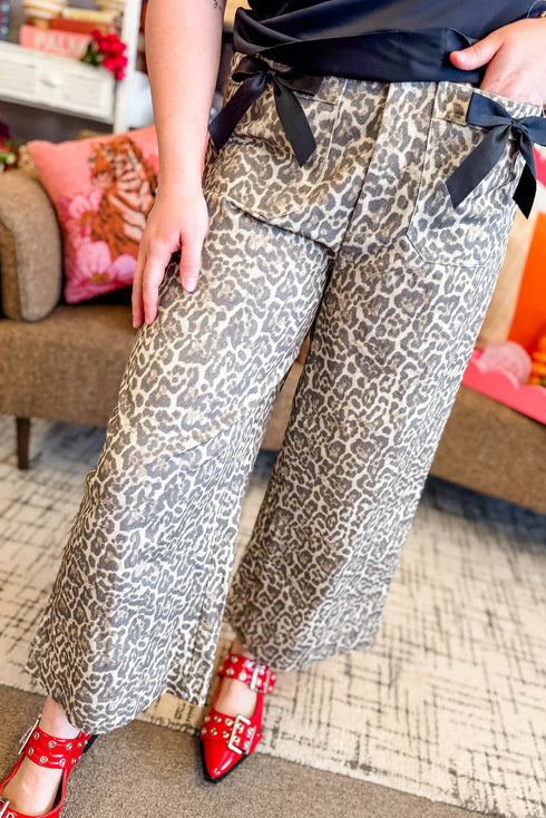 Trendy Women's Khaki Leopard Print Wide Leg Jeans with Bow Detail and Functional Patch Pockets for Casual Chic Style made for easy styling and