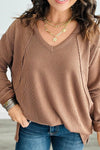 Chic Women's Chestnut V-Neck Long Sleeve Top with Twisted Ribbed Design and Exposed Seams for a Stylish, Comfortable Fit