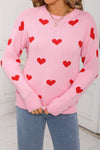 Cozy Women's Pink Heart Print Sweater with Drop Shoulders and Classic Round Neck for Casual Everyday Style