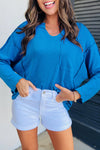Women's Stylish Blue Ribbed Long Sleeve V-Neck Knit Top with Exposed Seams - Comfortable Everyday Essential