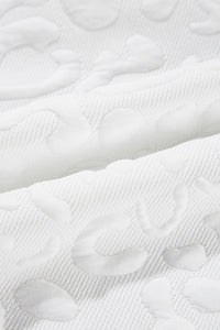 white-leopard-jacquard-quarter-zip-tee-and-shorts-set