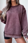 Trendy Women's Red Mineral Wash Sweatshirt with Exposed Seams and Side Slits for a Relaxed Fit
