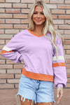 Orchid Bouquet Women's Cozy V-Neck Sweatshirt - Contrast Rib Knit, Drop Shoulder, Effortlessly Chic Patchwork Style