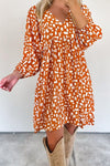 Women's Flowy Orange Geometric Short Dress with Tasseled Lace-Up V-Neck and Empire Waist for Effortless Summer Style