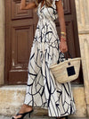 Contemporary Maxi Dress with Mesmerizing Abstract Face Print and V-Neckline