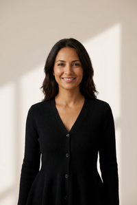 Women's V-Neck Button-Down Peplum Knit Sweater in Midnight Black made for easy styling and wardrobe coordination, with premium-like structure and