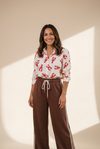 cinnamon wide leg women's pants with varsity stripes and comfortable drawstring waist for effortless style made for easy styling and wardrobe with