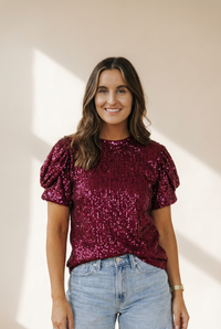 women's burgundy sequin puff sleeve blouse with relaxed silhouette made for easy styling and wardrobe coordination, with premium-like structure and