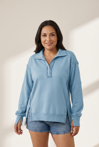 Light Blue Buttoned Polo Sweatshirt with High-Low Hem with practical styling and dependable silhouette control.