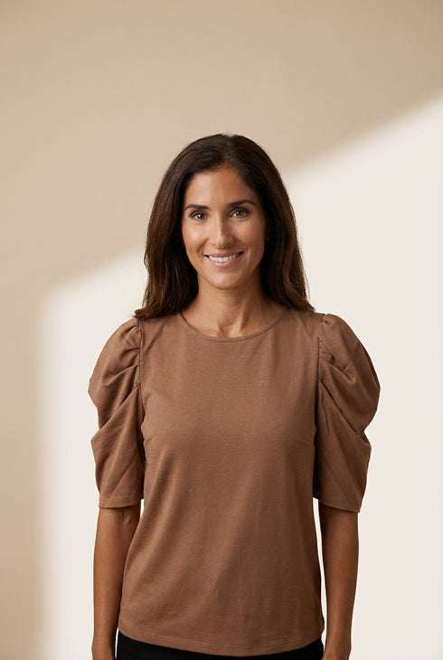 Women's Puff Sleeve Knit Blouse with Ruched Shoulders made for easy styling and wardrobe coordination, with premium-like structure and finish.
