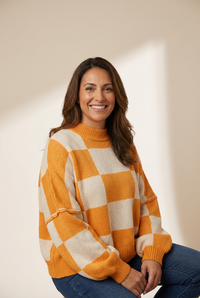 Women's Relaxed Fit Plaid Knit Sweater made for easy styling and wardrobe coordination, with premium-like structure and finish.