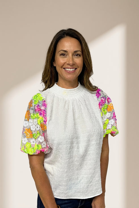 Women's Short Sleeve Sequin Embellished Top made for easy styling and wardrobe coordination, with premium-like structure and finish.
