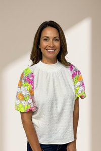 Women's Short Sleeve Sequin Embellished Top made for easy styling and wardrobe coordination, with premium-like structure and finish.