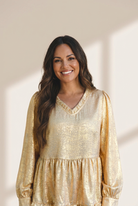 stylish women's gold metallic frilled v-neck puff sleeve babydoll blouse for day or night fashion looks with practical styling and dependable