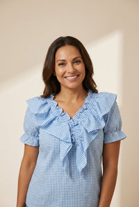 women's sky blue gingham ruffle v-neck puff sleeve blouse made for easy styling and wardrobe coordination, with premium-like structure and finish.