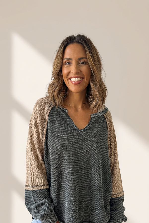 trendy women's dark grey color block sweatshirt with exposed seams - loose fit, casual mineral wash style made for easy styling and wardrobe with