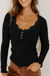Chic Women's Black Ribbed Long Sleeve Top with Lace Neckline, Button Accents, and Lettuce Hem for Effortless Style