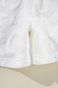 white-leopard-jacquard-quarter-zip-tee-and-shorts-set