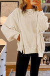 Women's Oversized White Waffle Knit Top with Bishop Sleeves and Trendy Split Detail for Effortless Chic Style