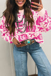 Trendy Women's Pink Western Print Sweater with Bows & Horseshoes - Cozy Casual Chic Fashion for Effortless Style